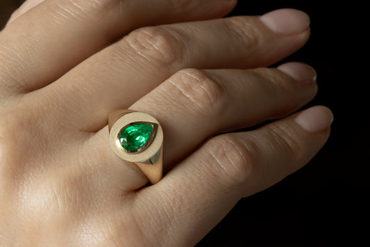 pear-cut emerald signet ring