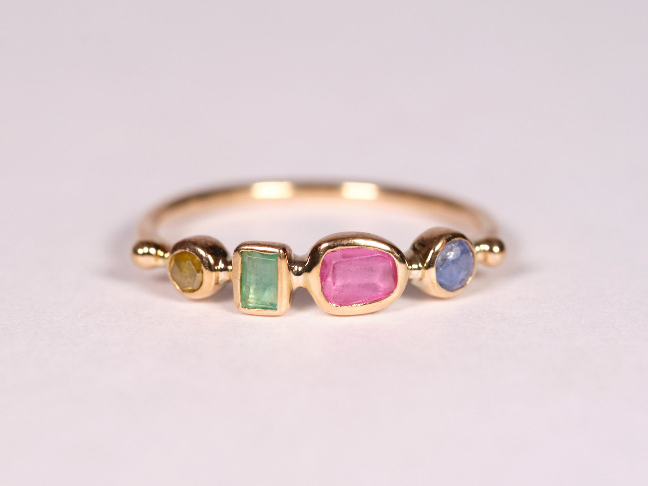 simple ring band - diamond + emerald + pink spinel + sapphire