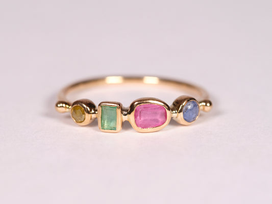 simple ring band - diamond + emerald + pink spinel + sapphire