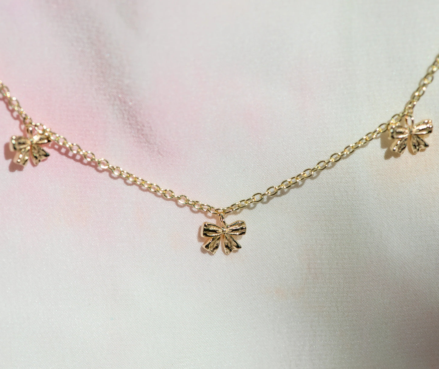 symphony of bows pendant necklace