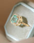 halo ring - nigerian emerald