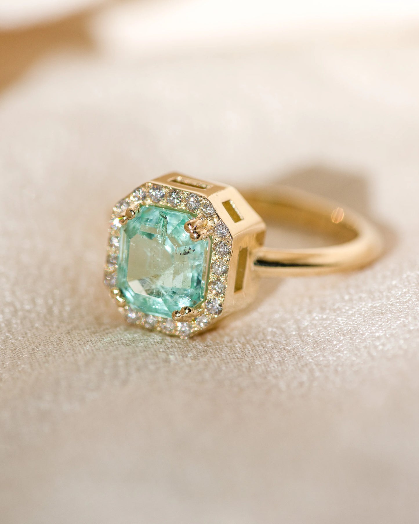 halo ring - nigerian emerald