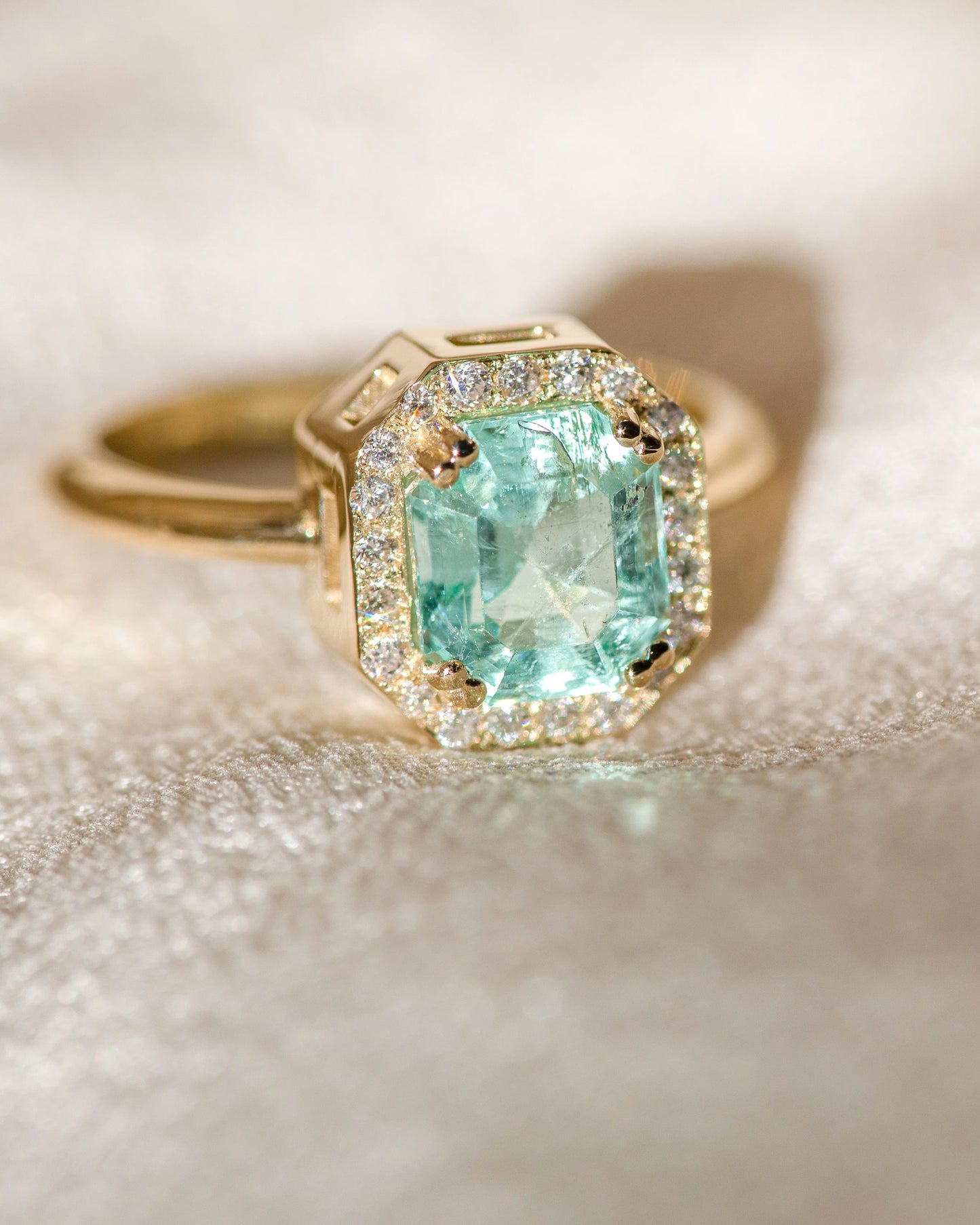 halo ring - nigerian emerald