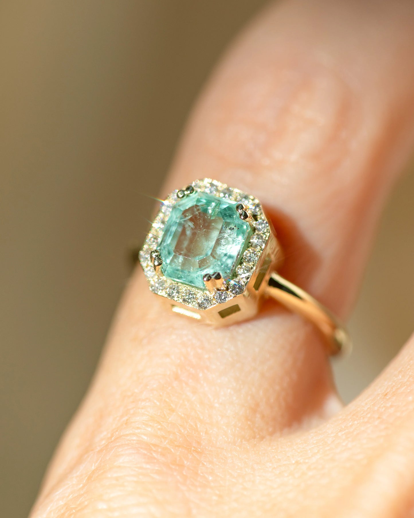 halo ring - nigerian emerald