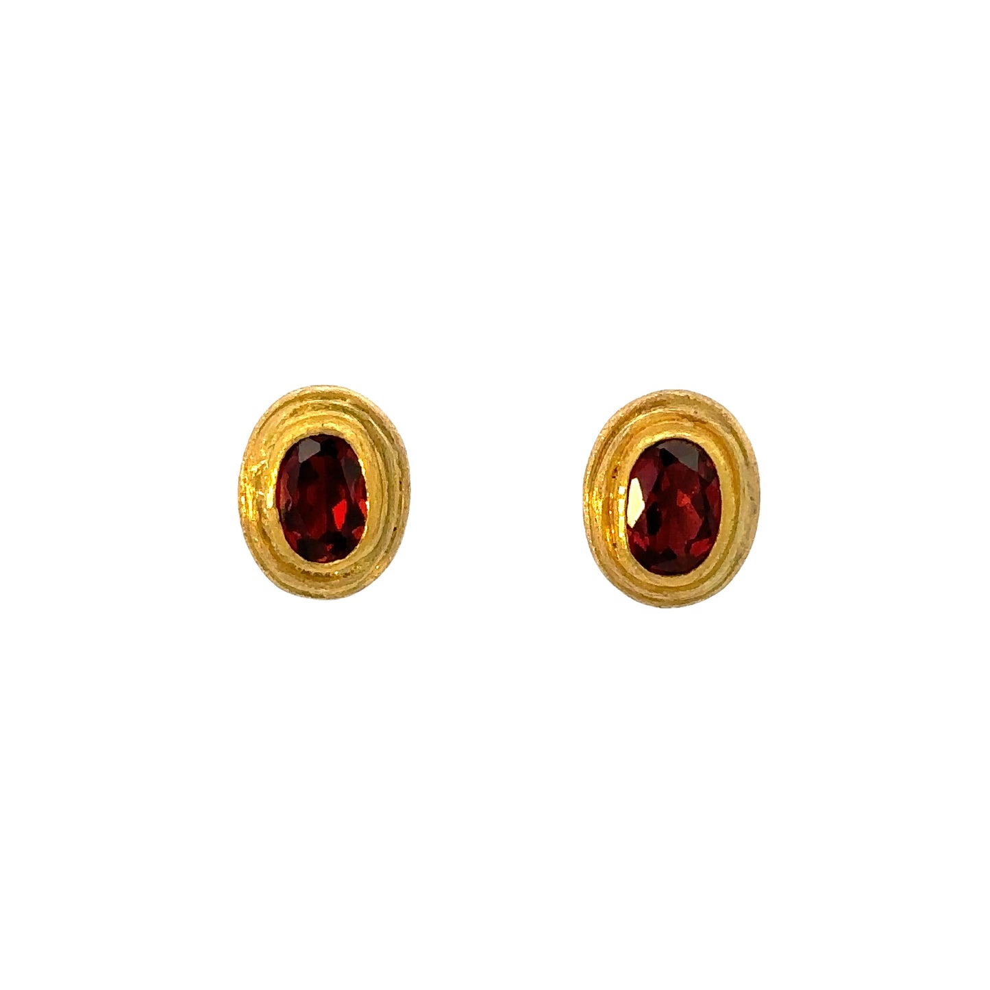 faceted oval garnet framed stud earrings